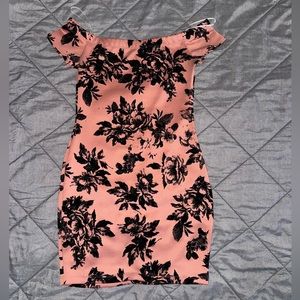 A flowery dress worn one time